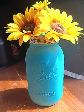 Bright blue 32 oz Ball Mason Jar with Sunflowers and ribbon